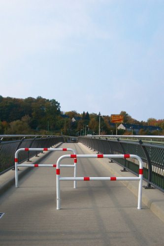 Access barriers removable and revolving with triangular locking mechanism without quarter-bent bar